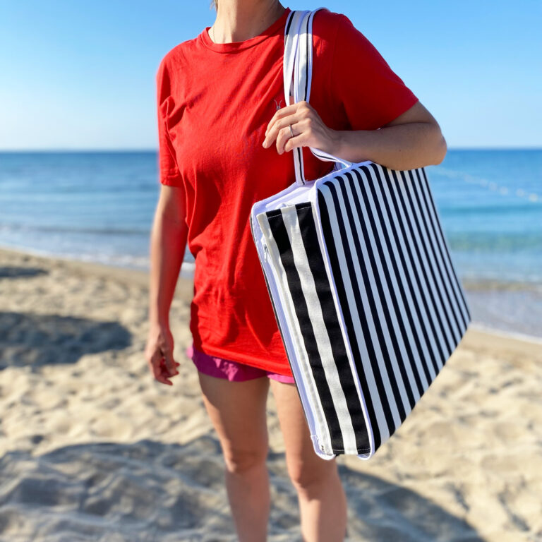 zipper beach bag on shoulder