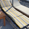 sunbed cushion opened on chaise lounge