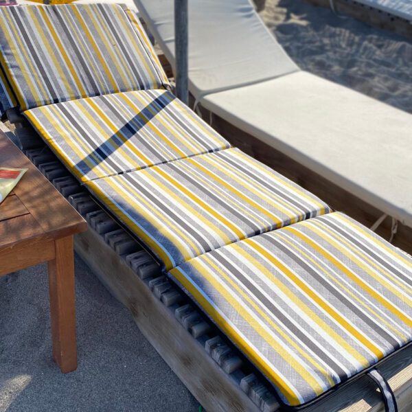 sunbed cushion opened on chaise lounge