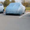car protection shield in gray tarp