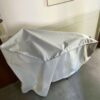 bike protection cover on bike inside home entrance