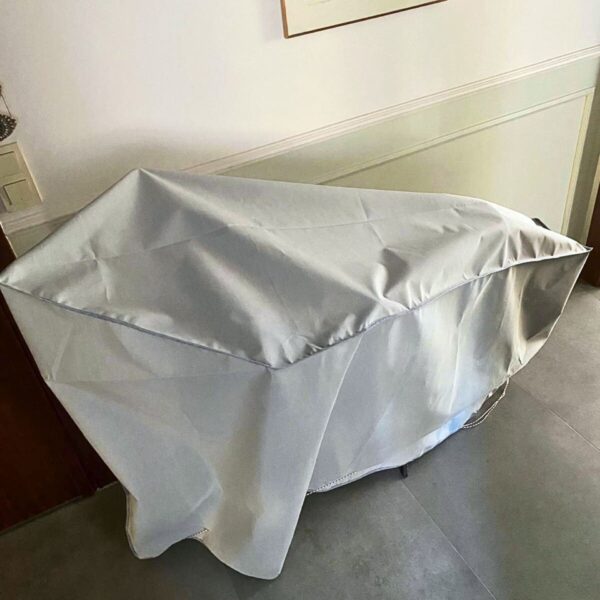 bike protection cover on bike inside home entrance