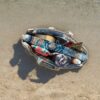 sun lounge cushion and beach bag convertible beach bag top view on the beach