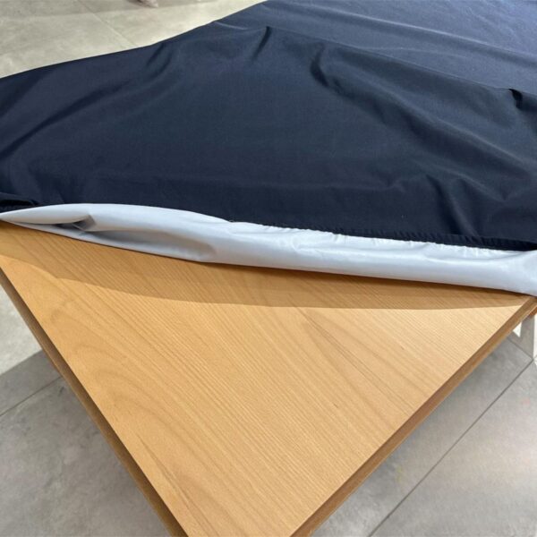 close up photo of a patio table cover in black