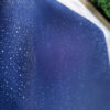 close up image of the canvas tarp cover with water repellent feature