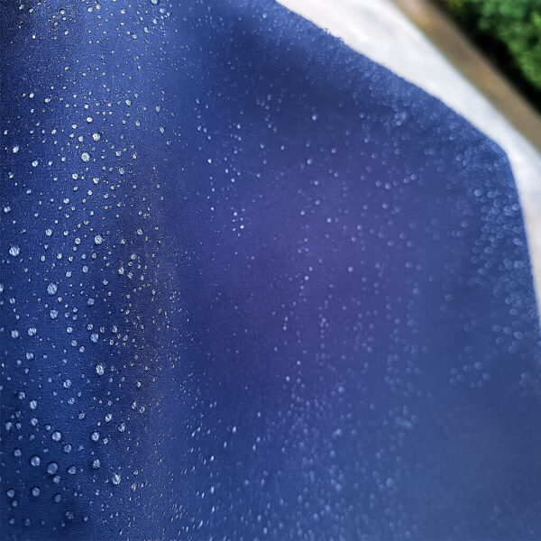 close up image of the canvas tarp cover with water repellent feature