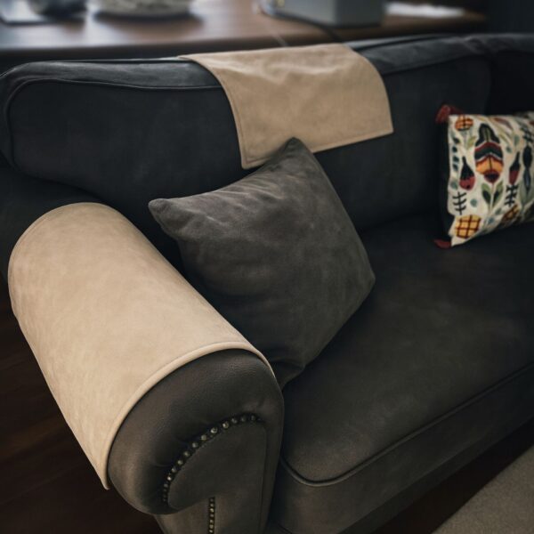 Modern living room with suede sofa arm pad protector installed