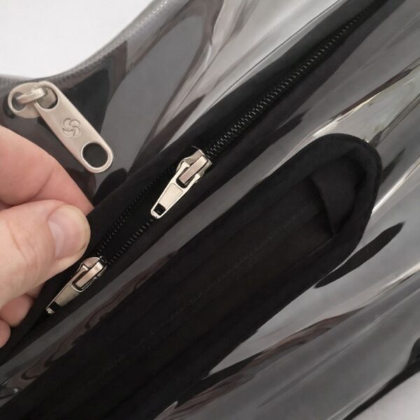 All-around zipper with hidden pullers under trims