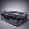 Clear waterproof luggage cover protecting suitcase during airport travel and checked baggage handling