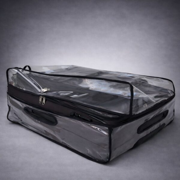 Clear waterproof luggage cover protecting suitcase during airport travel and checked baggage handling