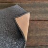 paw-friendly-fabric-sofa-cover-antrachite (5) Close-up of soft fleece pet proof couch armrest cover fabric