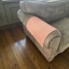 Tan sofa armrest cover displayed on elegant couch