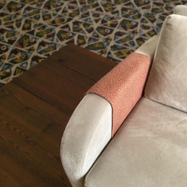 Tan fleece sofa armrest cover enhancing warm cozy interior